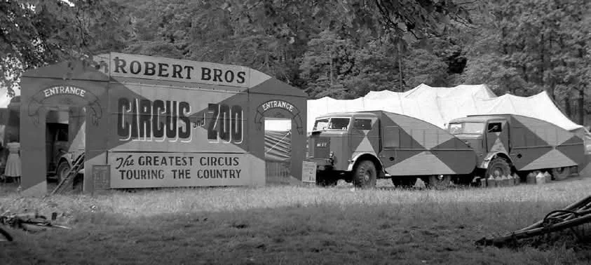 Ticket office and truck from a travelling circus and zoo
